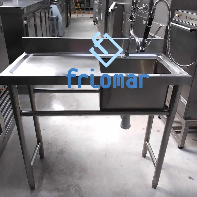 mesa fregadero con grifo ducha